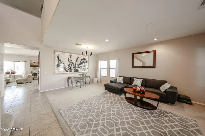 As you enter this Grand 5 Bedroom Buckeye home feel at home
