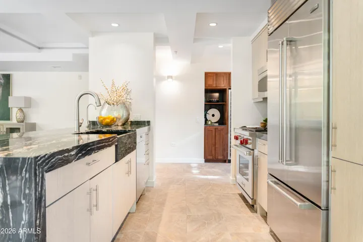 Upgraded appliances include Wolf, Miele, SubZero