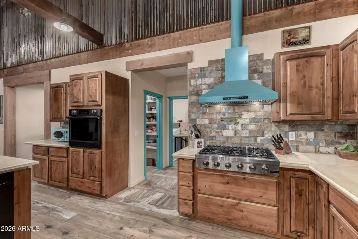main house gas range and custom hood