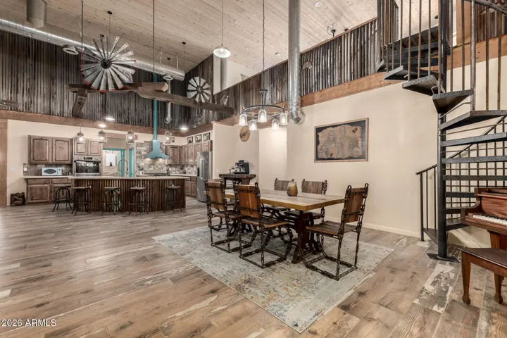 main house with spiral iron staircase up to loft and attached guest houses