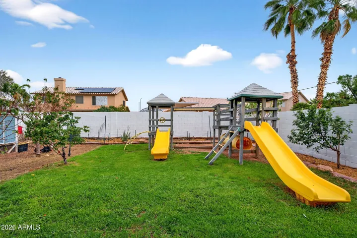 Playground and large grass area