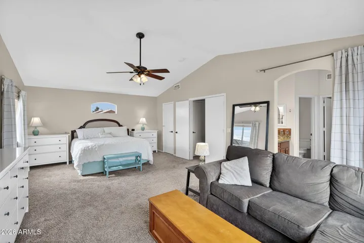 Huge primary bedroom upstairs with living space, 2 closets and large bathroom.