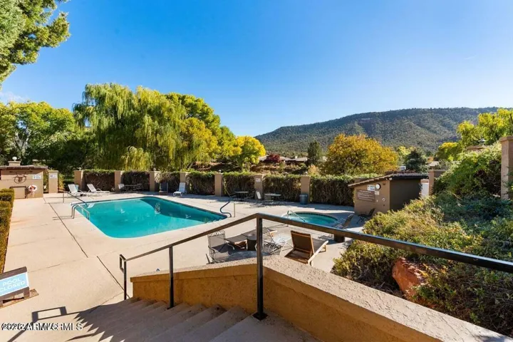 Residents and guests have access to a community swimming pool (generally seasonal, typically open from May through October) and a year-round hot tub.