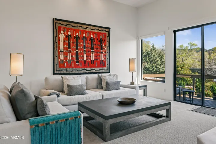 Thoughtful Integration: Each piece of art has been positioned to complement the home's contemporary aesthetic, ensuring that the interior design feels cohesive, sophisticated, and distinctly personal.