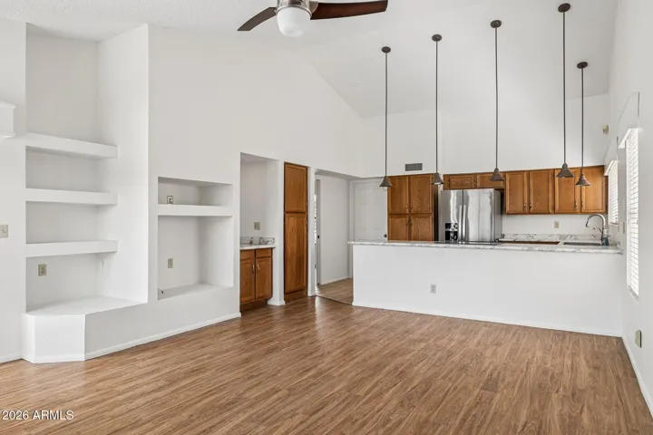 Integrated kitchen and family room with vaulted ceiling