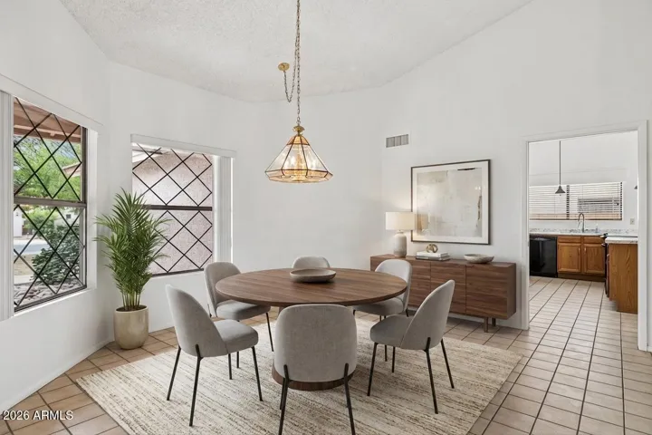Dining area connected to great room (virtually staged)