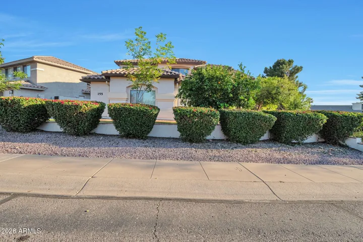 Low maintenance front yard with turf.