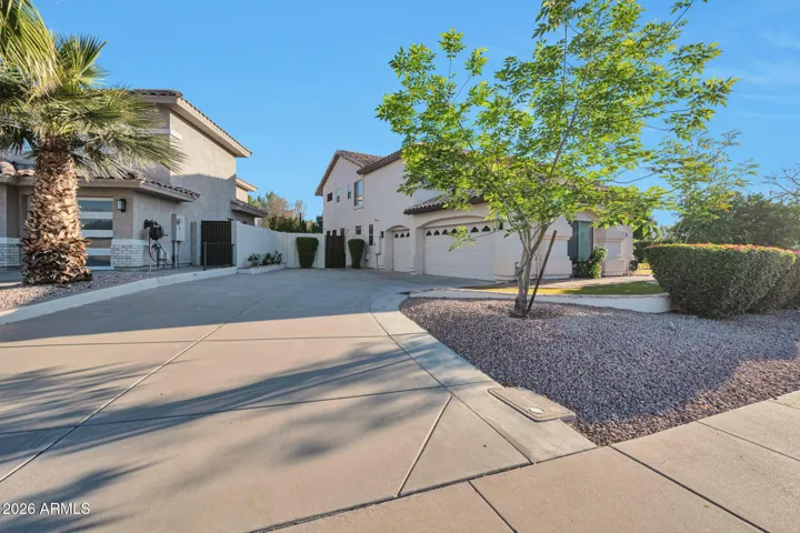 Large Driveway to 3 car garage