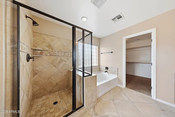 Owner's private En-suite tiled shower & separate tub