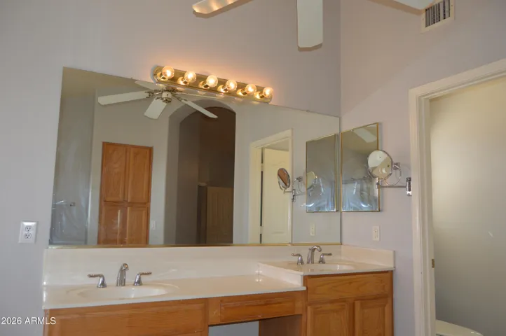 Primary Bathroom with Shower, Tub, 2 Vanities and Water Closet