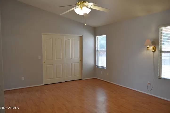 Primary Suite with Large Walk-in Closet and Entry from Backyard