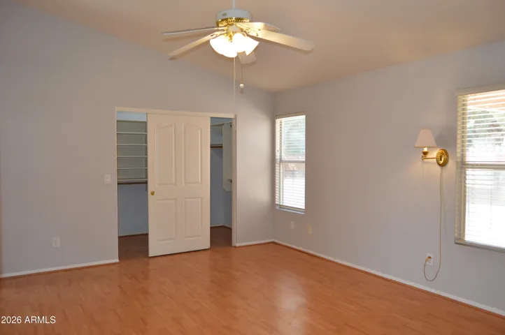 Primary Suite with Large Walk-in Closet and Entry from Backyard
