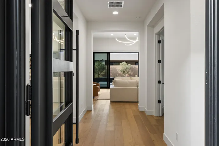 Breathtaking front door and foyer.