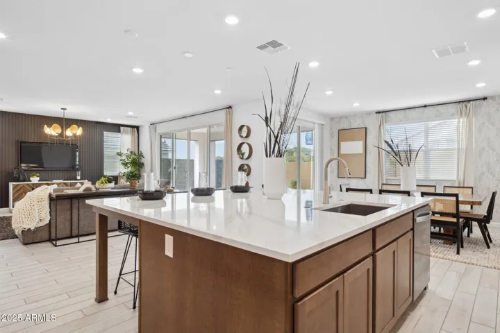 Photos of model home, options may vary. Large Eat in Island with Quartz Countertops.