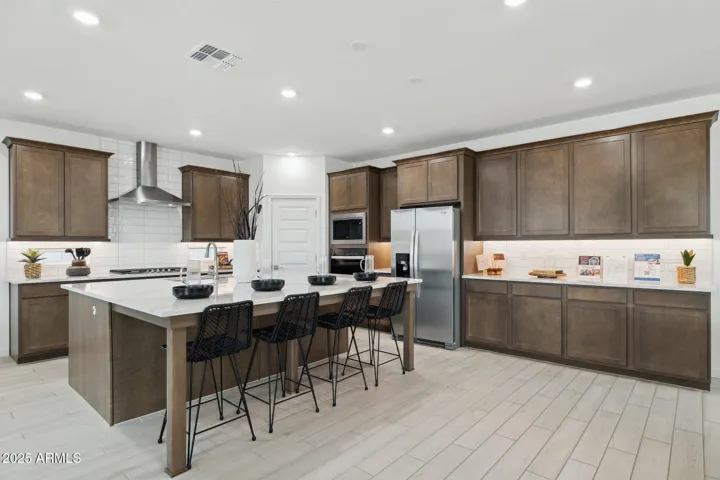 Photos of model home, options may vary. Extended Cabinetry perfect for Entertaining and Storage!