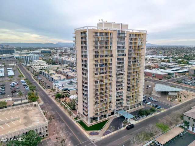 Aerial view of Executive Towers, proudly listed on the National Register of Historic Places, showcasing its iconic mid-century façade and prominent Midtown Phoenix setting.