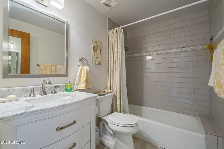 Guest Bath with updated tiled tub and vanity