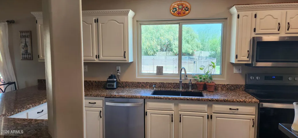 Newly refinished kitchen cabinets