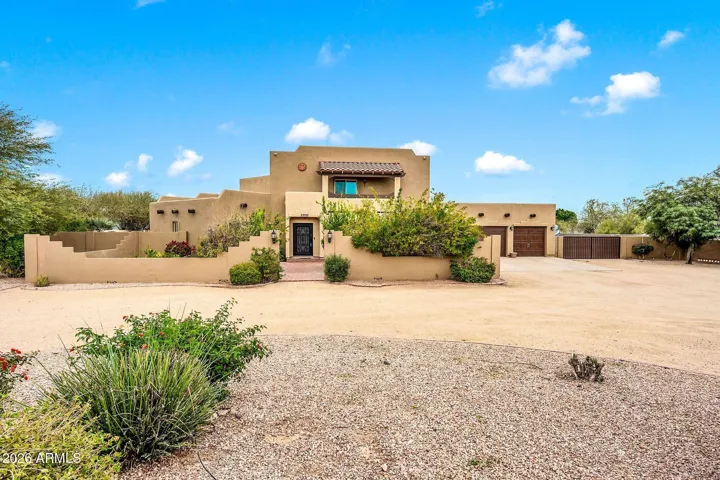 Front of home with center of circular driveway