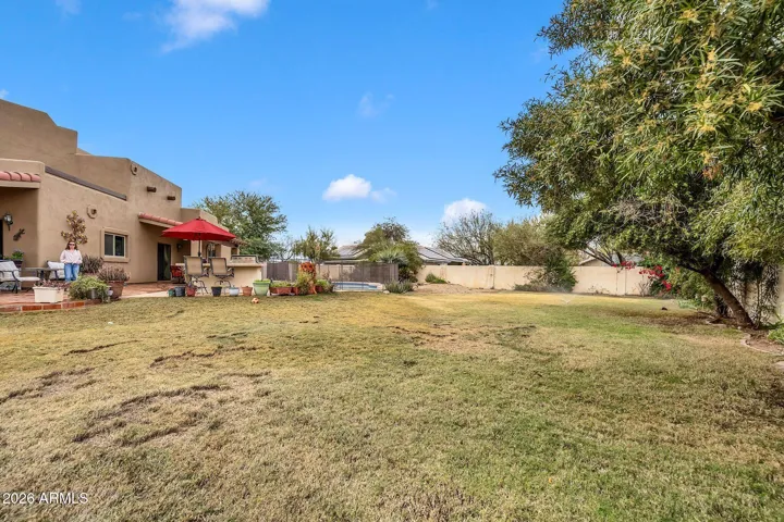 Fenced backyard separate from horse and RV area