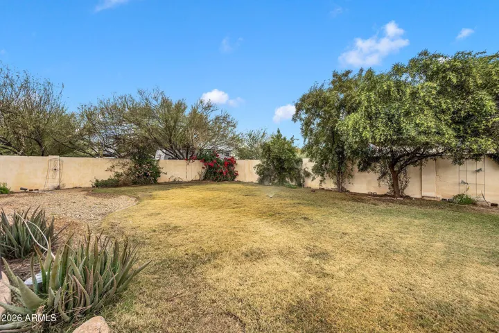Fenced backyard separate from horse and RV area