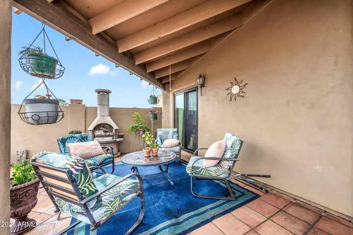 Second covered patio in backyard