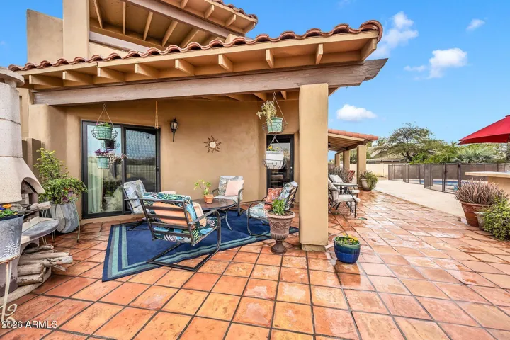 Second covered patio in backyard