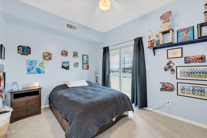 Upstairs bedroom #3 with walk-in closet and balcony
