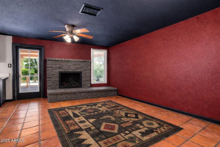 Digitally altered to give you an idea of what the fireplace and dining area would look like without the boxes