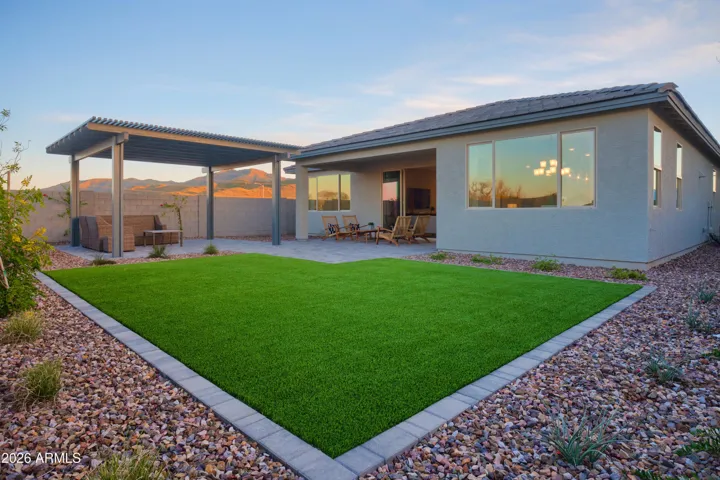 LARGE BACK YARD WITH NO BACK YARD NEIGHBORS!!! PAVERS, PERGULA, AND TURF ALL COMPLETED FOR YOU!