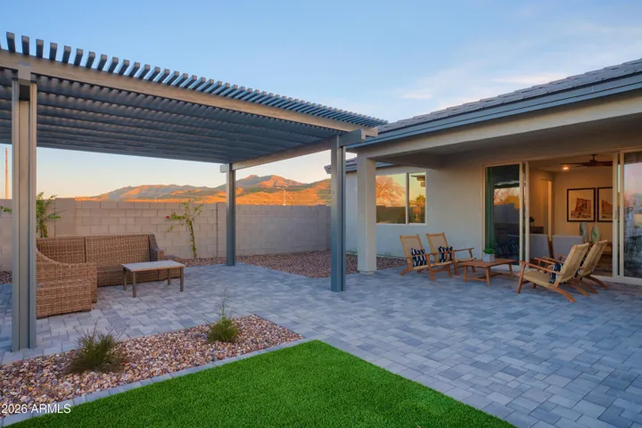 LARGE BACK YARD WITH NO BACK YARD NEIGHBORS!!! PAVERS, PERGULA, AND TURF ALL COMPLETED FOR YOU!