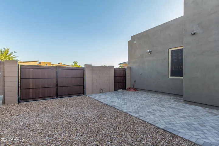 Pavered side yard with RV gate