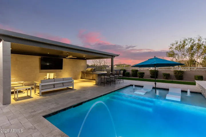 Pergola with built in BBQ and spacious seating areas for entertaining