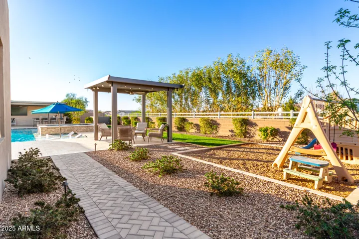 Second pergola with backyard play area
