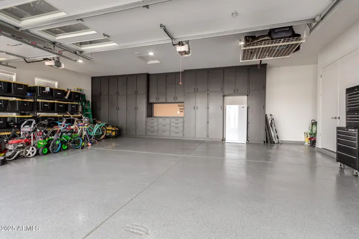 Custom floor to ceiling cabinets and built in workbench