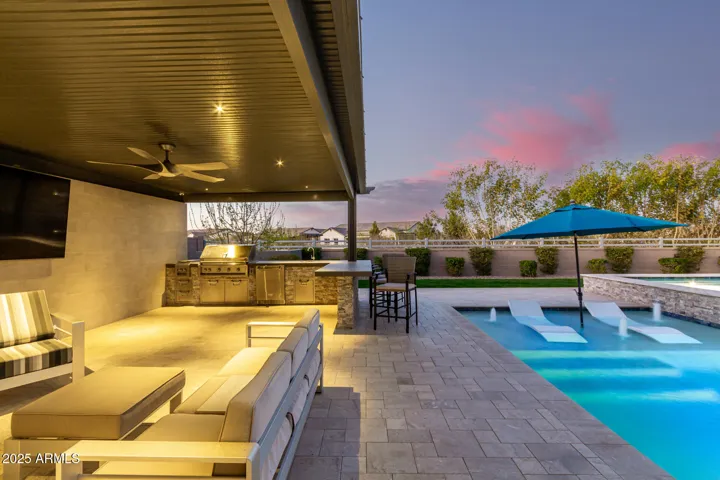 Pergola with built in BBQ and spacious seating areas for entertaining