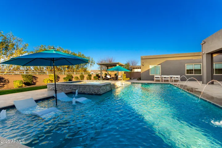 Lap pool with ledge loungers