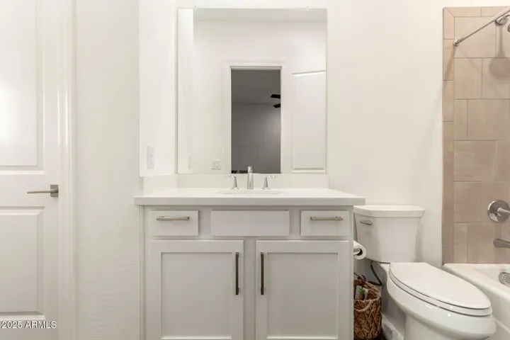 Bedroom 3 bathroom with walk in closet and private bath