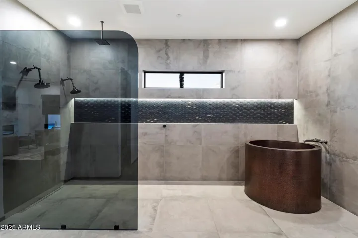 With duel shower heads abd copper, Japanese soaking tub