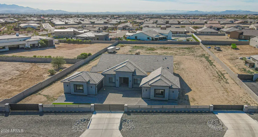 1.5 acres, completely surrounded with fence all around the lot