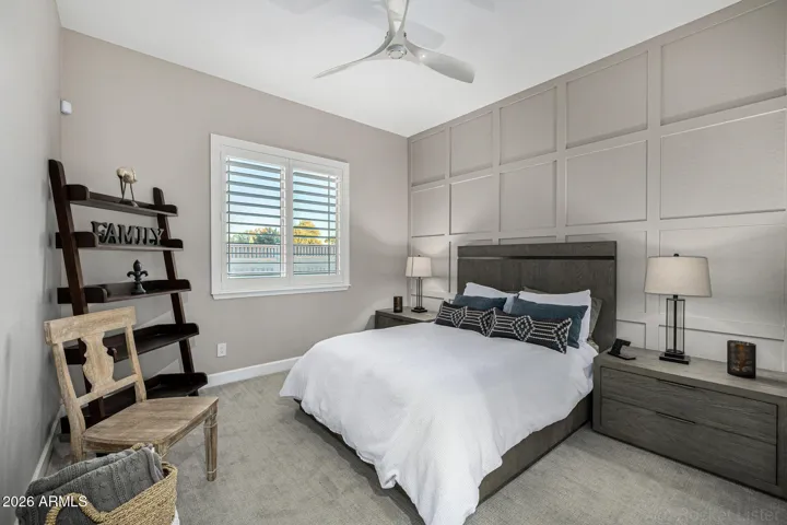 A beautifully appointed en-suite space offering both independence and comfort. Ample walk-in closet space ensures comfort and functionality for family and guests alike.
