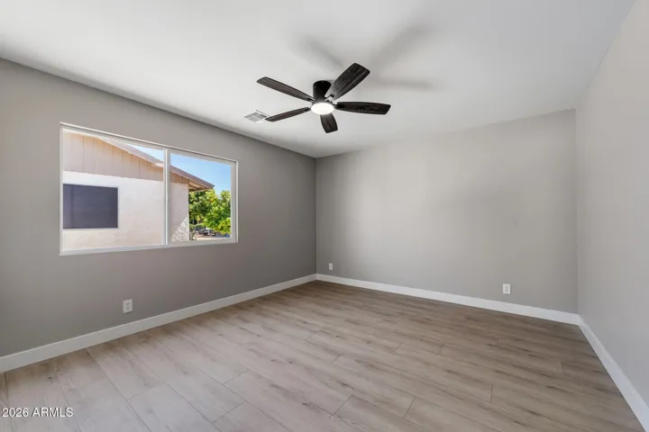 Guest bedroom with walk-in closet