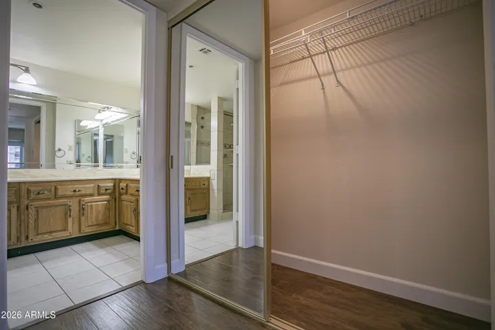 Primary - hallway to bathroom has 2 closets