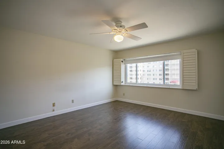 Primary with loads of wall space for dressers/art work.