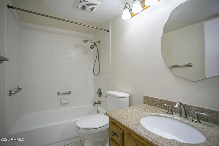 Guest bathroom has shower/tub combo