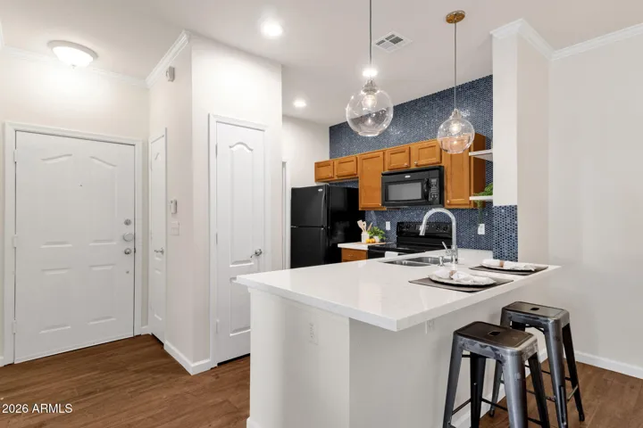 Pantry door in center, recessed and pendant lighting