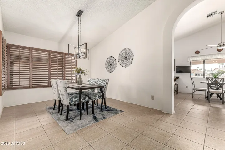 dining room w/ newer light fixture