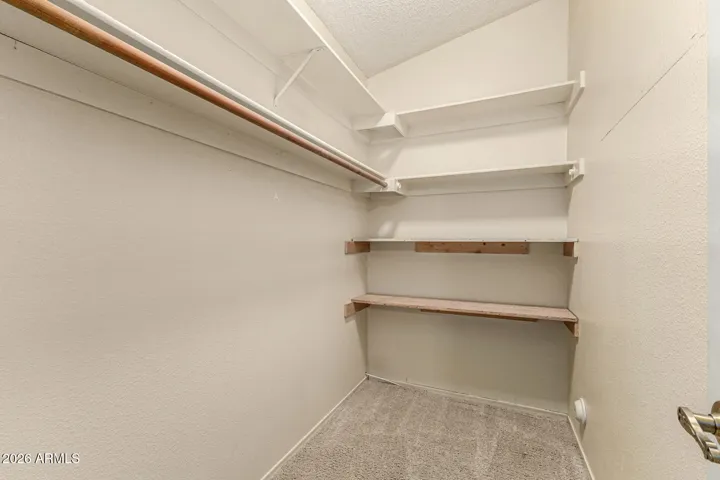 walk in closet w/buit-shelves