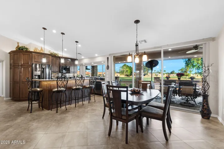 Kitchen dining looking to the golf course.