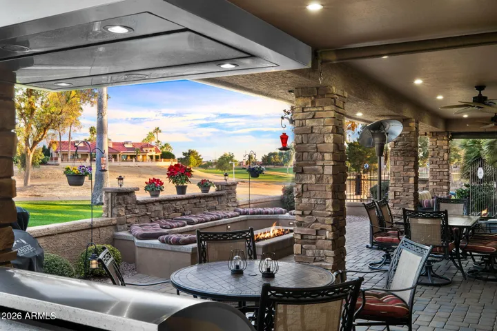Grill kitchen looking to the firepit and golf course.